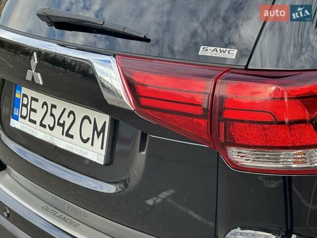 Черный Мицубиси Аутлендер, объемом двигателя 2.36 л и пробегом 90 тыс. км за 26500 $, фото 8 на Automoto.ua