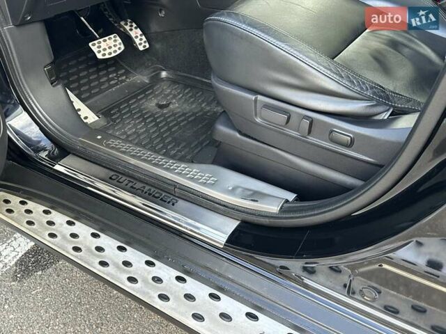 Черный Мицубиси Аутлендер, объемом двигателя 2.36 л и пробегом 90 тыс. км за 26500 $, фото 52 на Automoto.ua