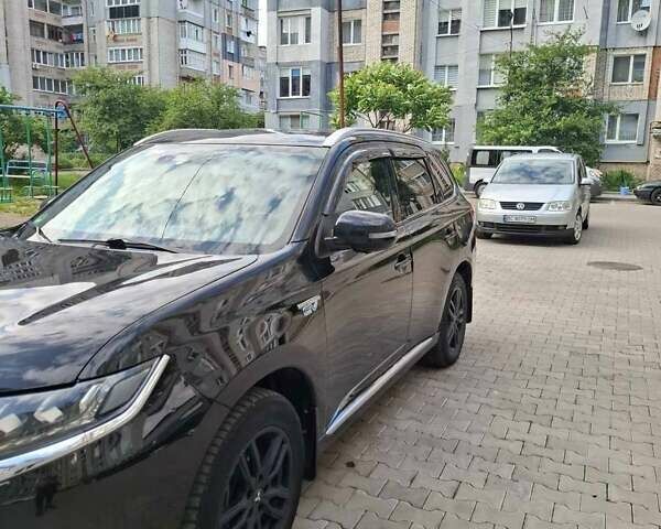 Черный Мицубиси Аутлендер, объемом двигателя 2.36 л и пробегом 67 тыс. км за 25925 $, фото 2 на Automoto.ua