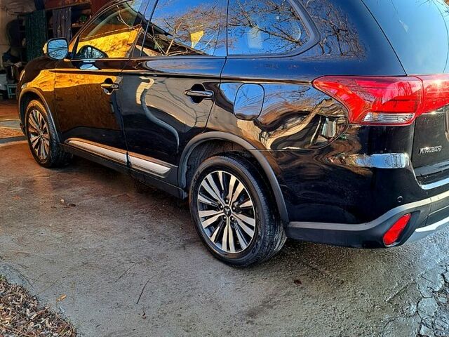 Чорний Міцубісі Аутлендер, об'ємом двигуна 2.4 л та пробігом 102 тис. км за 19200 $, фото 6 на Automoto.ua