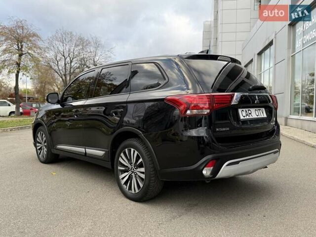 Чорний Міцубісі Аутлендер, об'ємом двигуна 2.36 л та пробігом 106 тис. км за 16250 $, фото 4 на Automoto.ua