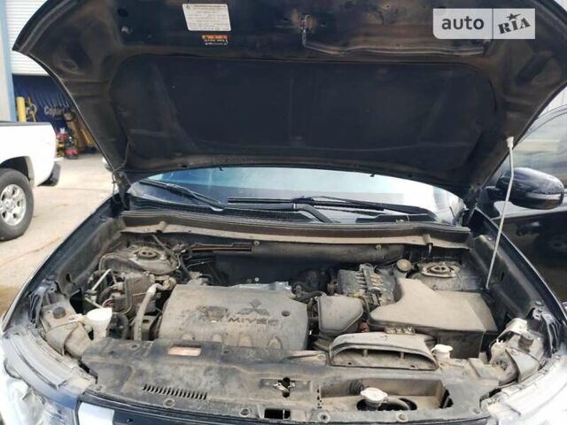Черный Мицубиси Аутлендер, объемом двигателя 2.36 л и пробегом 135 тыс. км за 2800 $, фото 5 на Automoto.ua