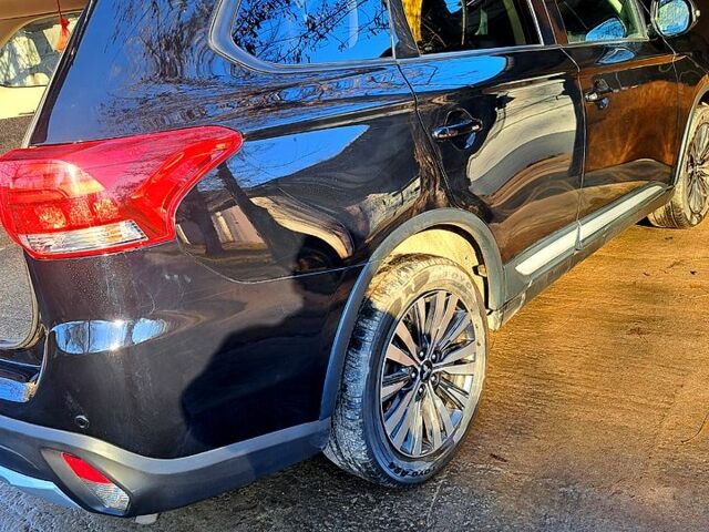 Чорний Міцубісі Аутлендер, об'ємом двигуна 2.4 л та пробігом 102 тис. км за 19200 $, фото 7 на Automoto.ua