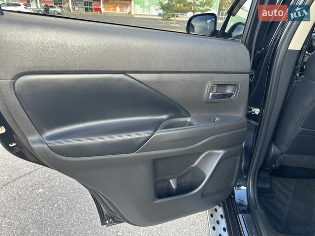 Черный Мицубиси Аутлендер, объемом двигателя 2.36 л и пробегом 90 тыс. км за 26500 $, фото 50 на Automoto.ua