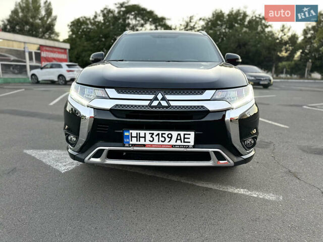 Чорний Міцубісі Аутлендер, об'ємом двигуна 2.36 л та пробігом 66 тис. км за 19800 $, фото 2 на Automoto.ua