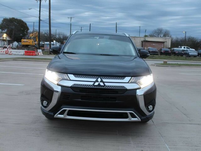Черный Мицубиси Аутлендер, объемом двигателя 3 л и пробегом 43 тыс. км за 6400 $, фото 1 на Automoto.ua