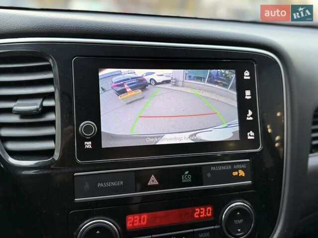 Чорний Міцубісі Аутлендер, об'ємом двигуна 2.36 л та пробігом 106 тис. км за 16250 $, фото 19 на Automoto.ua