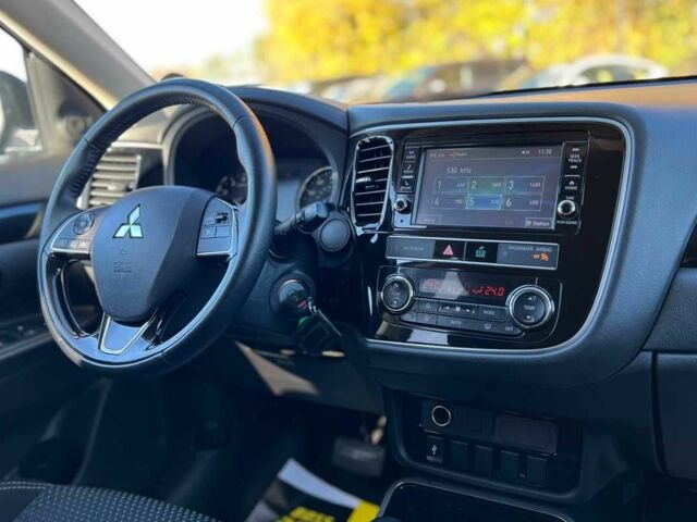 Чорний Міцубісі Аутлендер, об'ємом двигуна 2.4 л та пробігом 97 тис. км за 17700 $, фото 15 на Automoto.ua