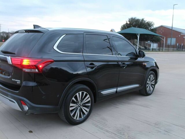 Черный Мицубиси Аутлендер, объемом двигателя 3 л и пробегом 43 тыс. км за 6400 $, фото 4 на Automoto.ua