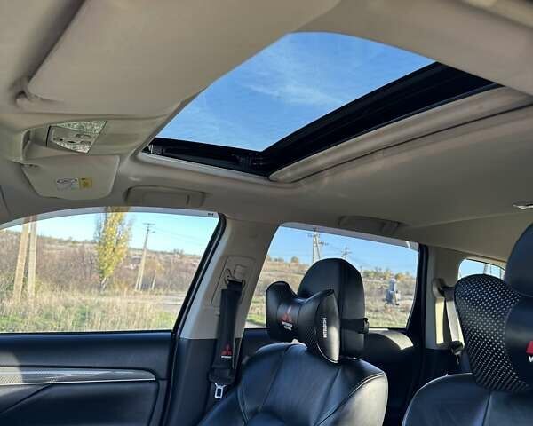 Черный Мицубиси Аутлендер, объемом двигателя 2.36 л и пробегом 90 тыс. км за 26500 $, фото 16 на Automoto.ua