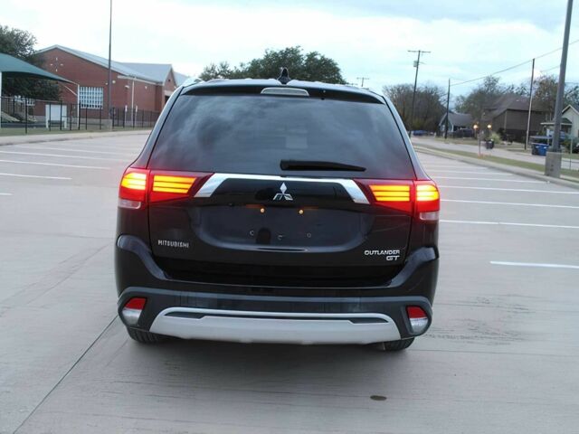 Черный Мицубиси Аутлендер, объемом двигателя 3 л и пробегом 43 тыс. км за 6400 $, фото 5 на Automoto.ua