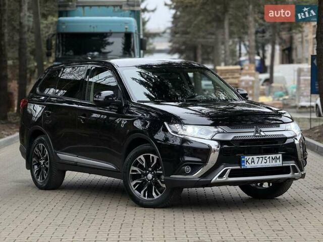 Черный Мицубиси Аутлендер, объемом двигателя 2 л и пробегом 65 тыс. км за 19950 $, фото 3 на Automoto.ua