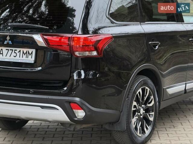 Черный Мицубиси Аутлендер, объемом двигателя 2 л и пробегом 65 тыс. км за 19950 $, фото 6 на Automoto.ua