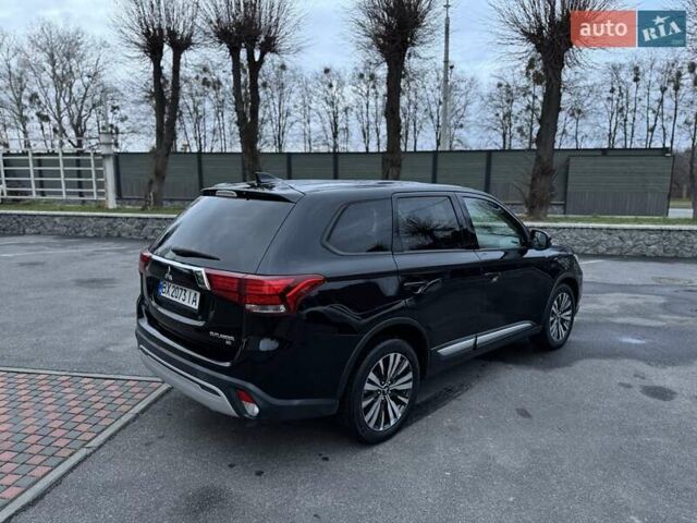 Чорний Міцубісі Аутлендер, об'ємом двигуна 2.36 л та пробігом 132 тис. км за 15900 $, фото 3 на Automoto.ua