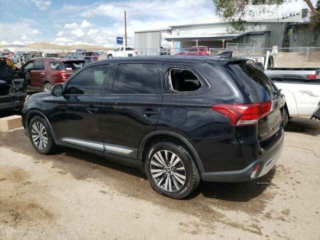 Черный Мицубиси Аутлендер, объемом двигателя 2.36 л и пробегом 135 тыс. км за 2800 $, фото 1 на Automoto.ua