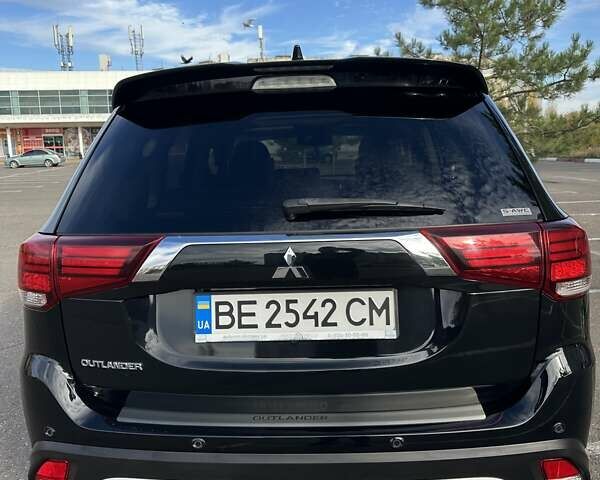 Черный Мицубиси Аутлендер, объемом двигателя 2.36 л и пробегом 90 тыс. км за 26500 $, фото 6 на Automoto.ua