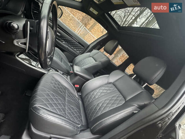 Черный Мицубиси Аутлендер, объемом двигателя 2 л и пробегом 148 тыс. км за 21800 $, фото 19 на Automoto.ua