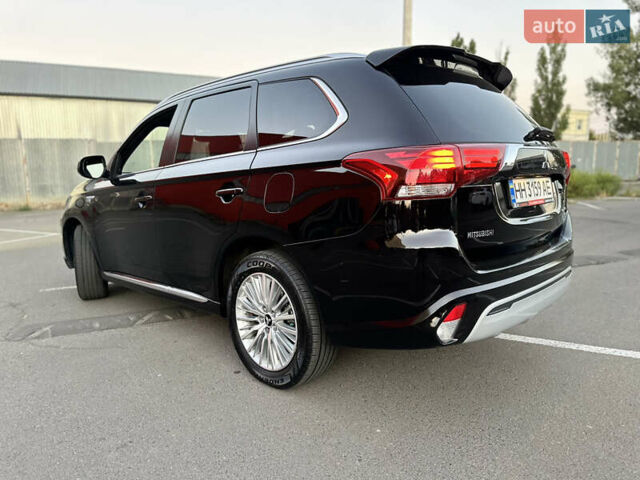 Чорний Міцубісі Аутлендер, об'ємом двигуна 2.36 л та пробігом 66 тис. км за 19800 $, фото 12 на Automoto.ua