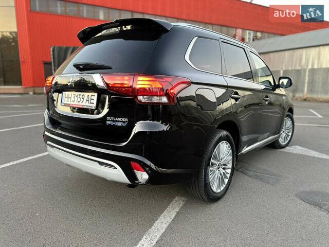 Чорний Міцубісі Аутлендер, об'ємом двигуна 2.36 л та пробігом 66 тис. км за 19800 $, фото 6 на Automoto.ua