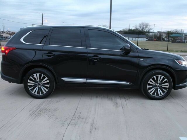 Черный Мицубиси Аутлендер, объемом двигателя 3 л и пробегом 43 тыс. км за 6400 $, фото 7 на Automoto.ua