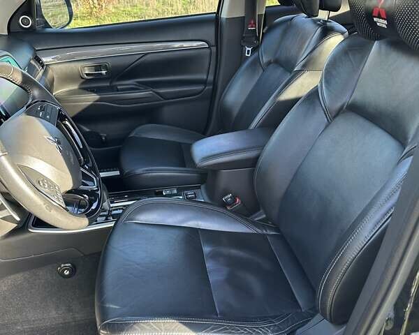 Черный Мицубиси Аутлендер, объемом двигателя 2.36 л и пробегом 90 тыс. км за 26500 $, фото 19 на Automoto.ua