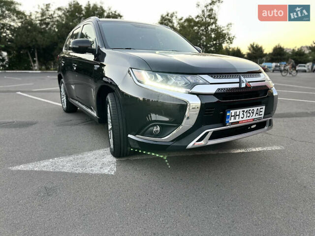 Чорний Міцубісі Аутлендер, об'ємом двигуна 2.36 л та пробігом 66 тис. км за 19800 $, фото 4 на Automoto.ua