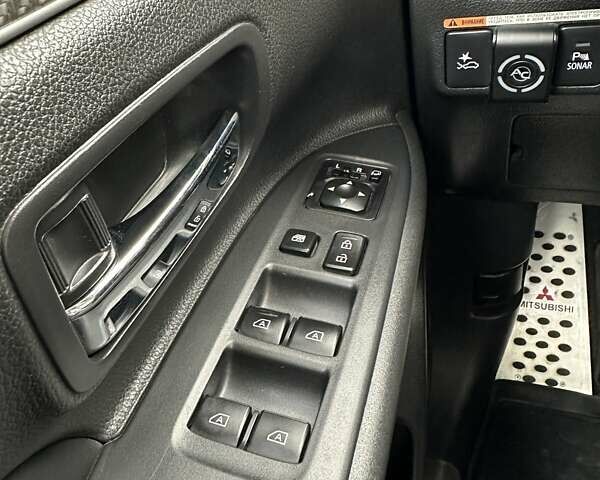 Черный Мицубиси Аутлендер, объемом двигателя 2.36 л и пробегом 90 тыс. км за 26500 $, фото 71 на Automoto.ua