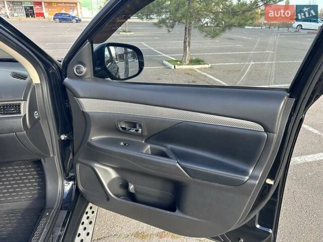 Черный Мицубиси Аутлендер, объемом двигателя 2.36 л и пробегом 90 тыс. км за 26500 $, фото 49 на Automoto.ua