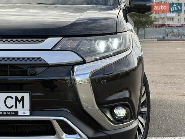 Черный Мицубиси Аутлендер, объемом двигателя 2.36 л и пробегом 90 тыс. км за 26500 $, фото 47 на Automoto.ua