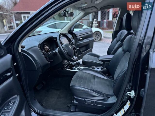 Чорний Міцубісі Аутлендер, об'ємом двигуна 2.36 л та пробігом 132 тис. км за 15900 $, фото 15 на Automoto.ua