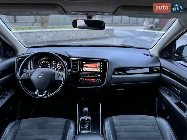 Чорний Міцубісі Аутлендер, об'ємом двигуна 2.36 л та пробігом 132 тис. км за 15900 $, фото 12 на Automoto.ua