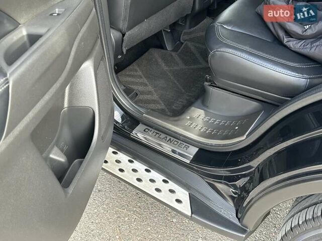 Черный Мицубиси Аутлендер, объемом двигателя 2.36 л и пробегом 90 тыс. км за 26500 $, фото 55 на Automoto.ua