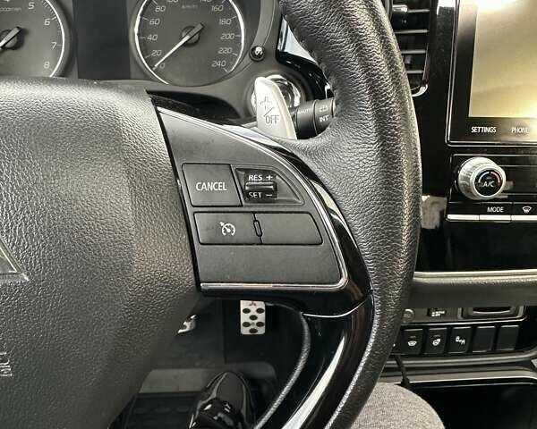 Черный Мицубиси Аутлендер, объемом двигателя 2.36 л и пробегом 90 тыс. км за 26500 $, фото 74 на Automoto.ua