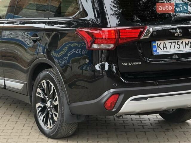 Черный Мицубиси Аутлендер, объемом двигателя 2 л и пробегом 65 тыс. км за 19950 $, фото 9 на Automoto.ua
