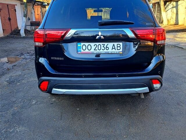 Чорний Міцубісі Аутлендер, об'ємом двигуна 2.4 л та пробігом 102 тис. км за 19200 $, фото 2 на Automoto.ua
