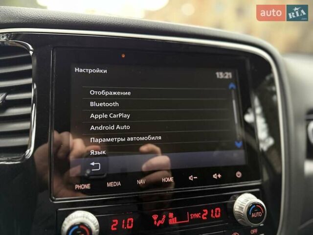 Черный Мицубиси Аутлендер, объемом двигателя 2 л и пробегом 65 тыс. км за 19950 $, фото 32 на Automoto.ua