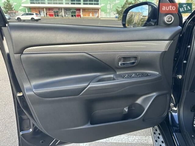 Черный Мицубиси Аутлендер, объемом двигателя 2.36 л и пробегом 90 тыс. км за 26500 $, фото 48 на Automoto.ua