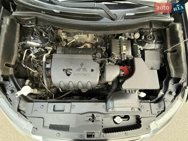 Чорний Міцубісі Аутлендер, об'ємом двигуна 2.36 л та пробігом 106 тис. км за 16250 $, фото 25 на Automoto.ua