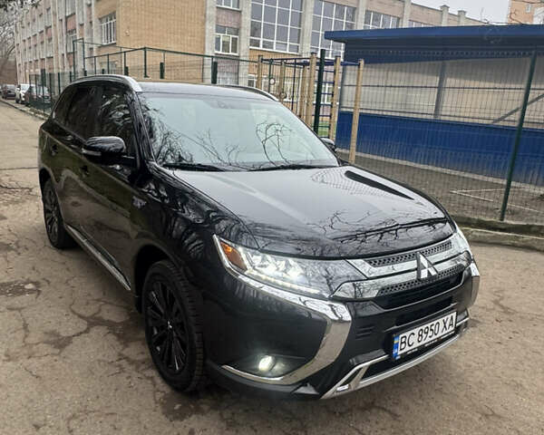 Черный Мицубиси Аутлендер, объемом двигателя 2 л и пробегом 148 тыс. км за 21800 $, фото 5 на Automoto.ua