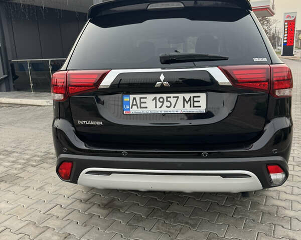 Чорний Міцубісі Аутлендер, об'ємом двигуна 2.36 л та пробігом 53 тис. км за 23500 $, фото 4 на Automoto.ua