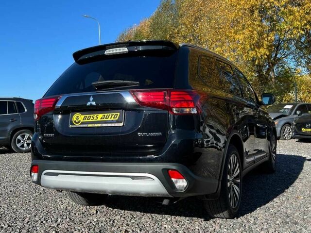 Чорний Міцубісі Аутлендер, об'ємом двигуна 2.4 л та пробігом 97 тис. км за 17700 $, фото 5 на Automoto.ua