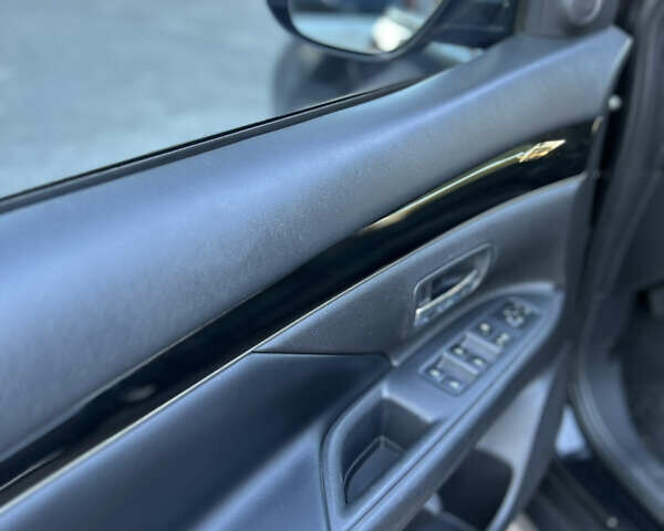 Черный Мицубиси Аутлендер, объемом двигателя 2.36 л и пробегом 67 тыс. км за 19500 $, фото 11 на Automoto.ua