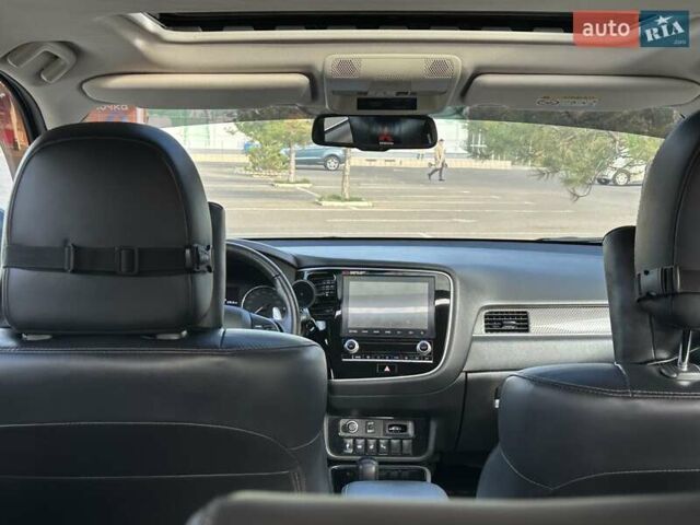 Черный Мицубиси Аутлендер, объемом двигателя 2.36 л и пробегом 90 тыс. км за 26500 $, фото 15 на Automoto.ua