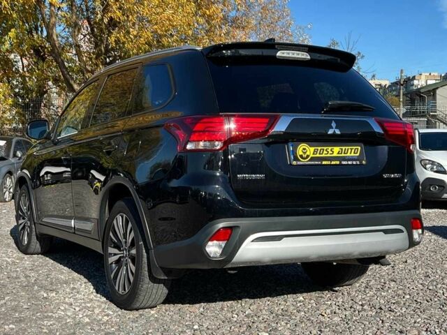 Чорний Міцубісі Аутлендер, об'ємом двигуна 2.4 л та пробігом 97 тис. км за 17700 $, фото 3 на Automoto.ua