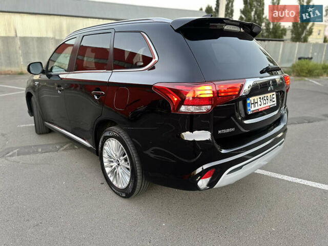 Чорний Міцубісі Аутлендер, об'ємом двигуна 2.36 л та пробігом 66 тис. км за 19800 $, фото 9 на Automoto.ua