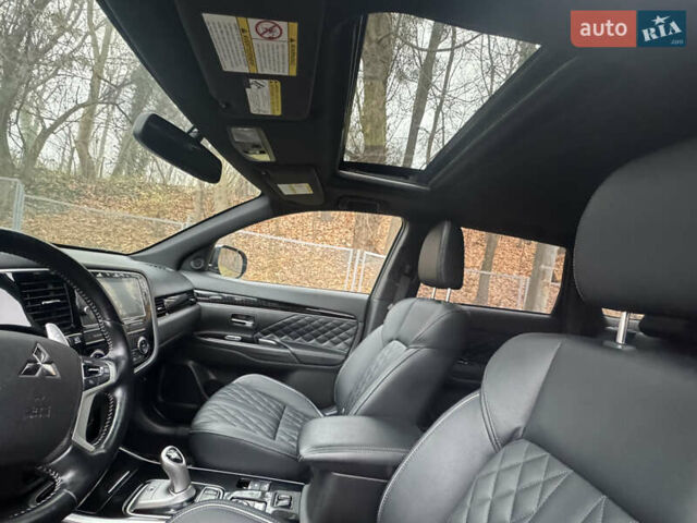 Черный Мицубиси Аутлендер, объемом двигателя 2 л и пробегом 148 тыс. км за 21800 $, фото 20 на Automoto.ua
