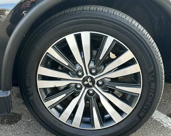 Черный Мицубиси Аутлендер, объемом двигателя 2.36 л и пробегом 90 тыс. км за 26500 $, фото 56 на Automoto.ua