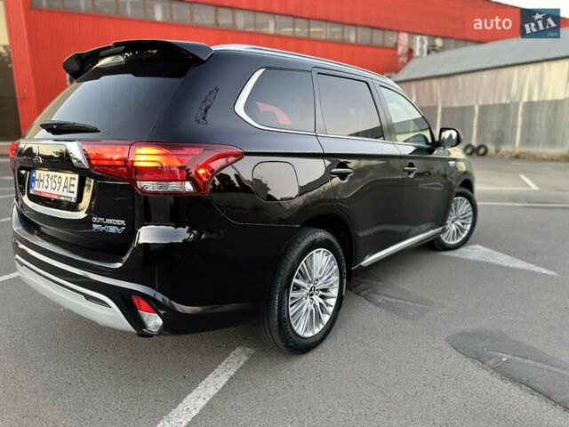 Чорний Міцубісі Аутлендер, об'ємом двигуна 2.36 л та пробігом 66 тис. км за 19800 $, фото 11 на Automoto.ua
