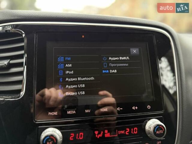 Черный Мицубиси Аутлендер, объемом двигателя 2 л и пробегом 65 тыс. км за 19950 $, фото 36 на Automoto.ua