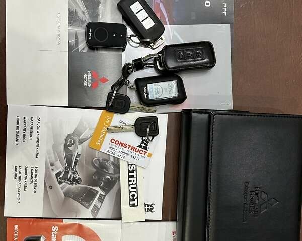 Черный Мицубиси Аутлендер, объемом двигателя 2.36 л и пробегом 90 тыс. км за 26500 $, фото 84 на Automoto.ua